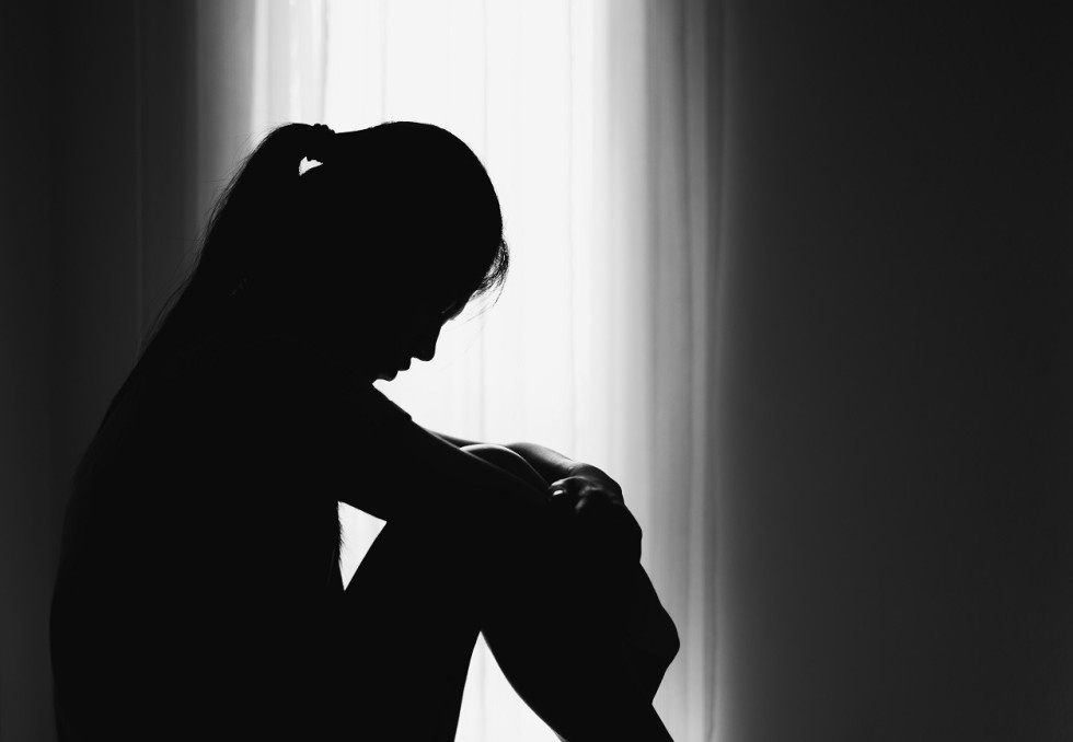 Ombre femme triste