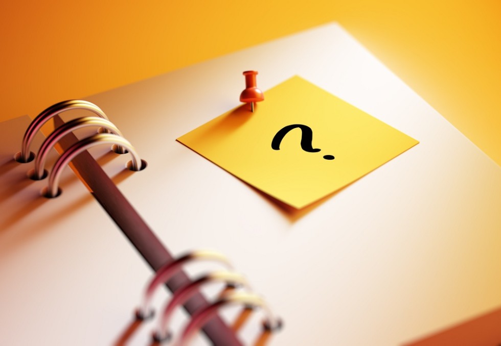 Point d'interrogation sur un carnet